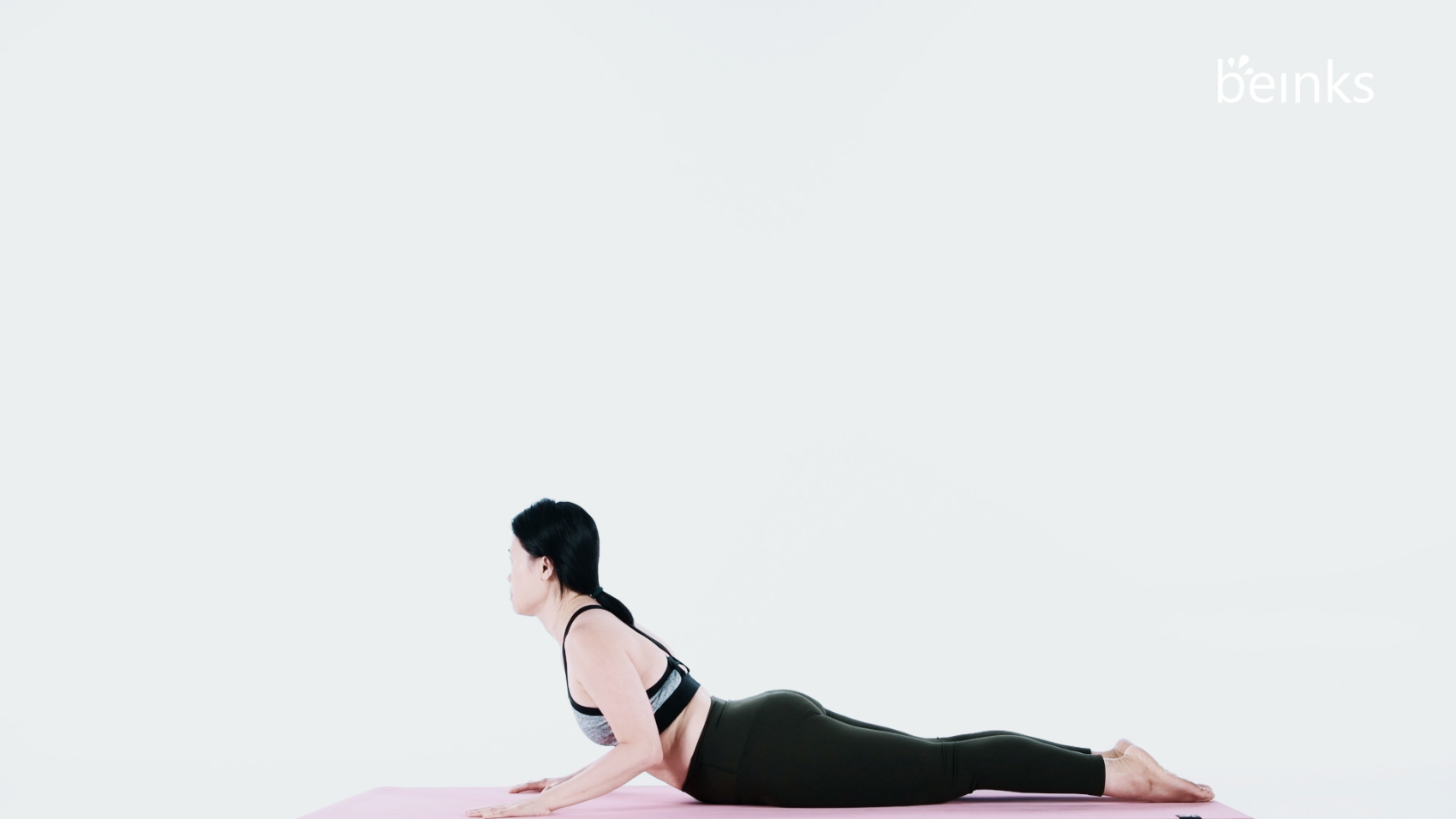 Snake (Sarpasana) – Yoga Poses Guide by WorkoutLabs